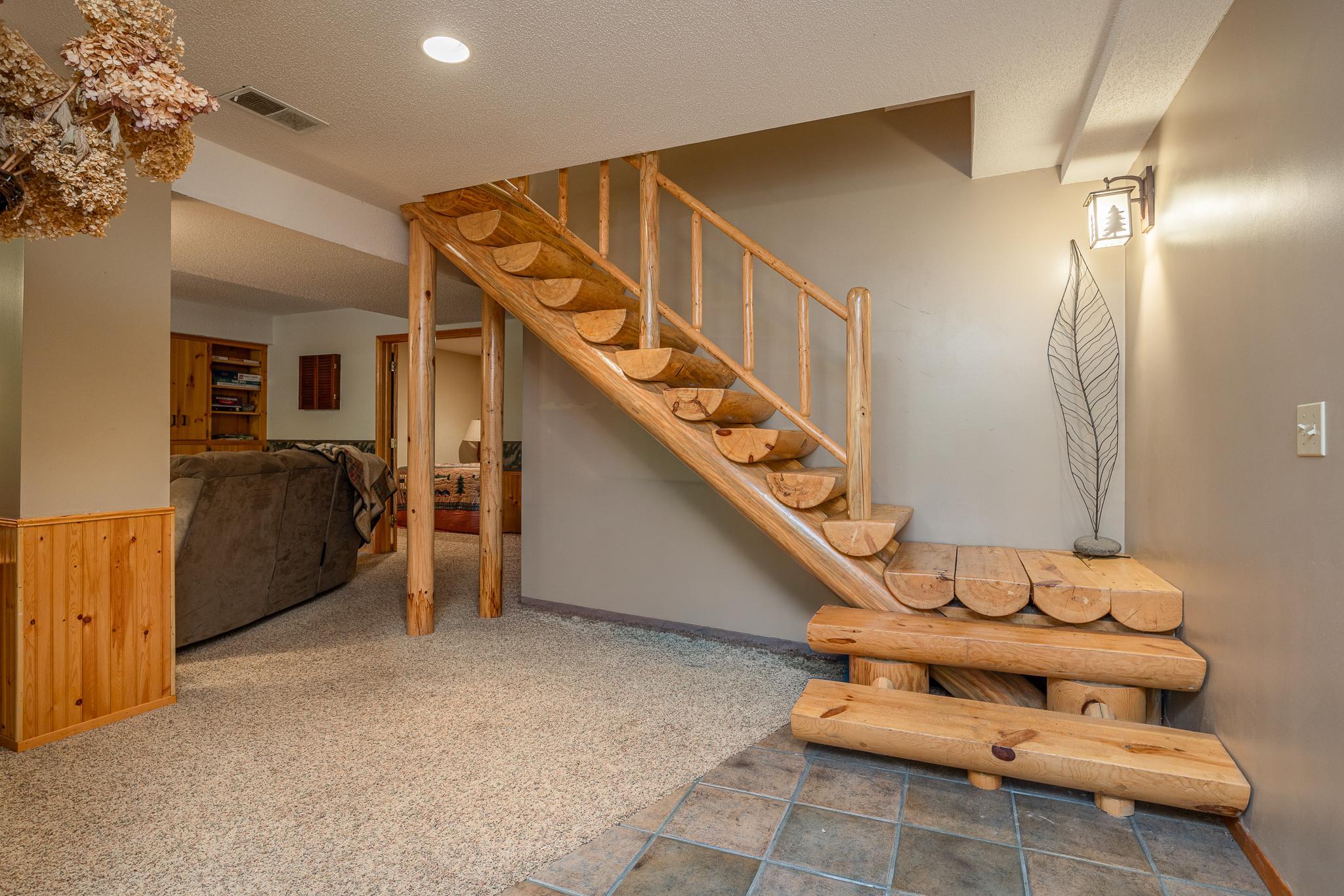 Half log stairwell to upper level
