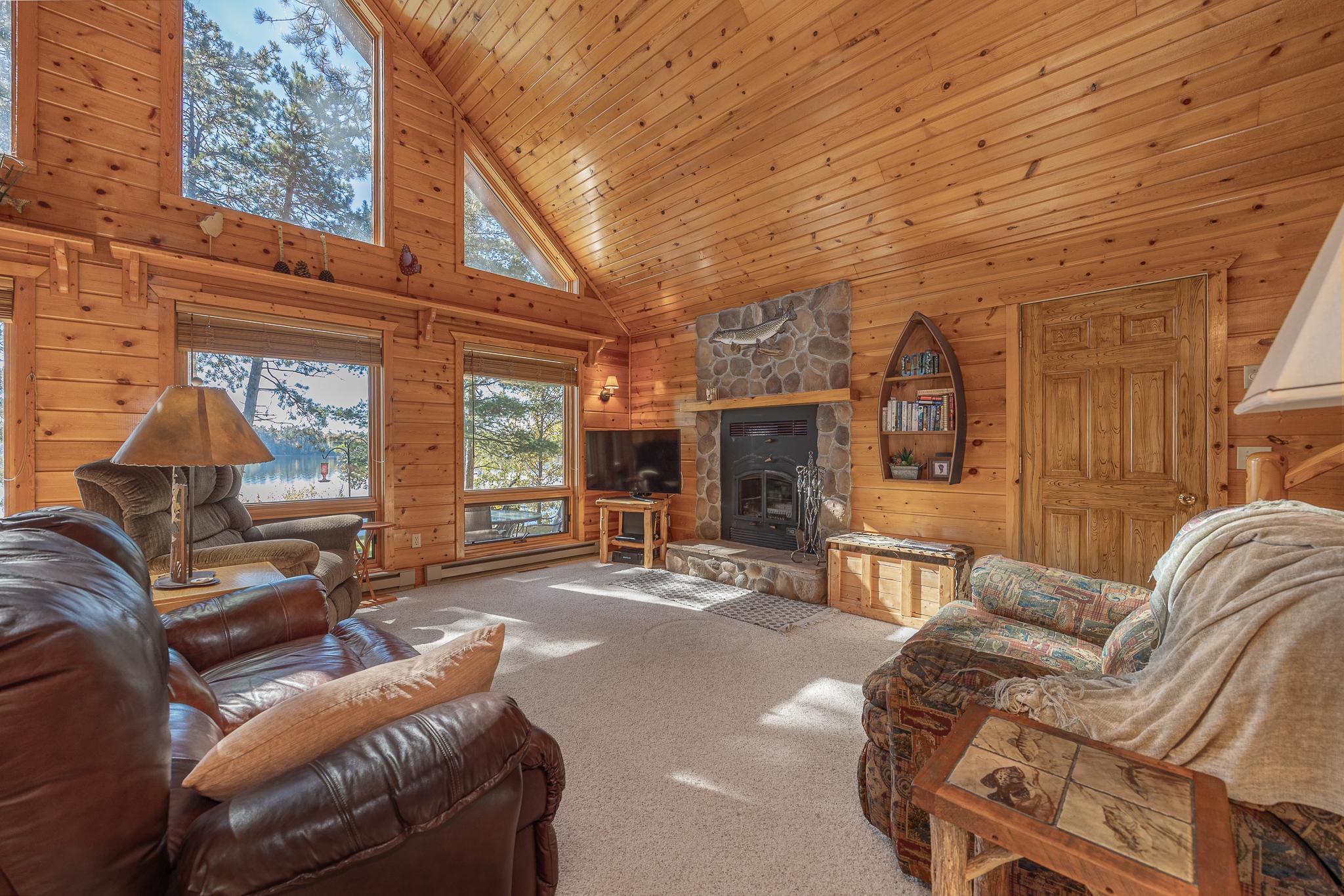 Living room with wood burning fireplace