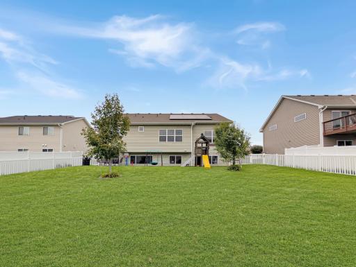 What a beautiful back yard with plenty of room for kids and pets!