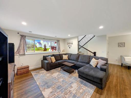 With this cozy family room in the basement, there is plenty of room for your family and guests to feel right at home!