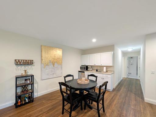 Wet bar with room for a table and chairs.