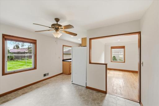 Living room flows into the dining area and kitchen