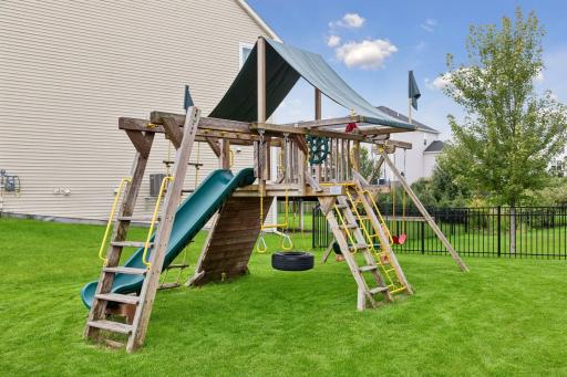 Large yard with swing set which can be left with home if desired.