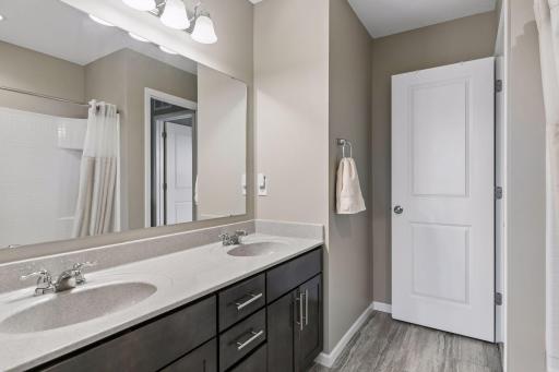 Upper level shared bath with dual sink vanity