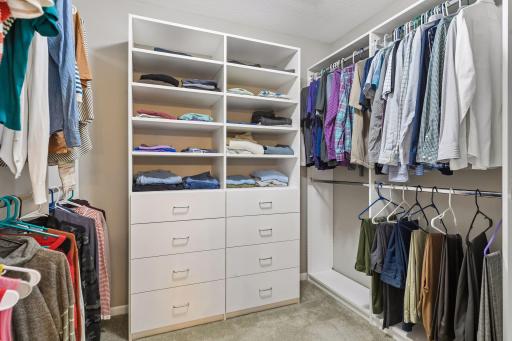 Primary bedroom complete with custom upgraded custom shelving