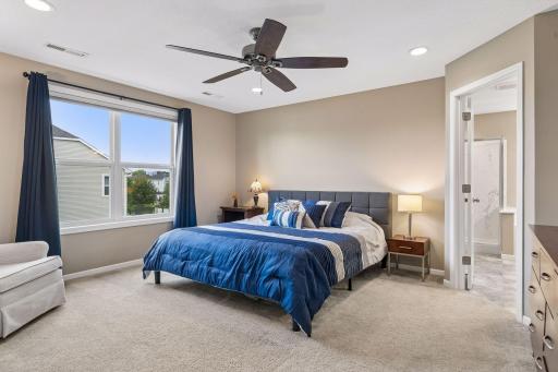 Spacious owner's suite with large window for plenty of natural light