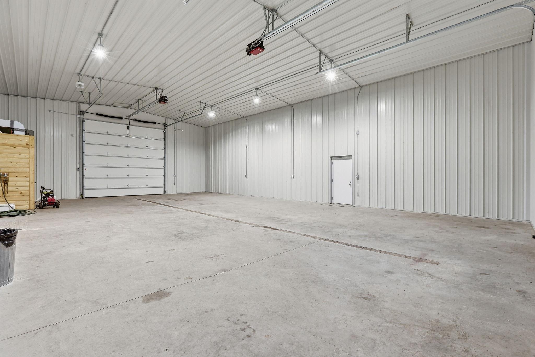 Spacious 34'x54' Finished and Heated Shop with 14' Garage Doors at Both Ends