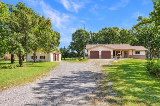 2.24 acres with a spacious rambler and a huge outbuilding.