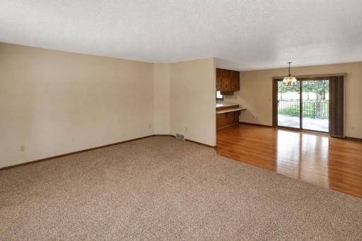Spacious living room view, open to the dining area