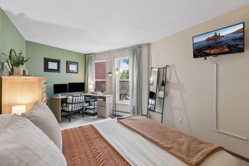 Plenty of sunlight in the bedroom with space for your work-from-home setup.