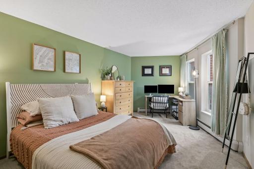 Your bedroom is ample enough for a home office.