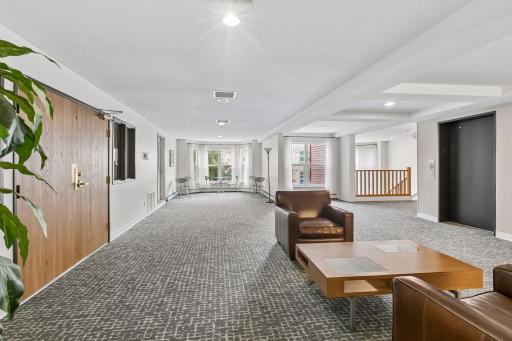 The community room is thru the double doors on your left, the convenient elevator is to your right.