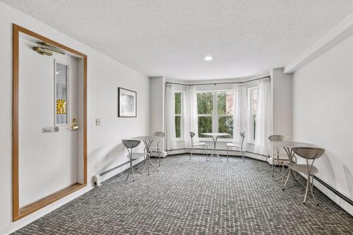 Step thru the door to your left and out onto the private screened-in porch.
