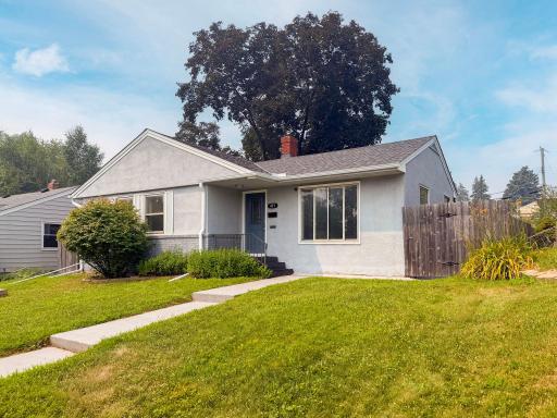Blue sky, green grass, and a brand new roof overhead giving you one less thing to think about. This is the kind of curb appeal that makes you slow down before you even park.