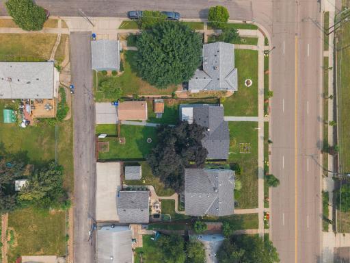 The full footprint from above, house, patio, garage, and garden bed all working together as one complete picture of home.