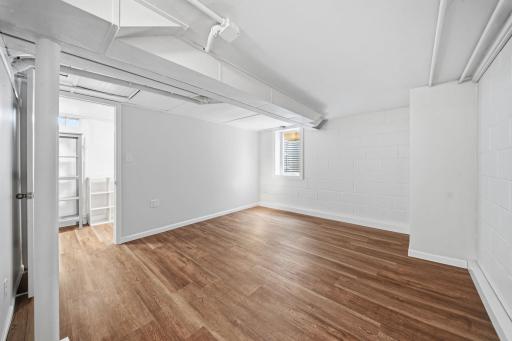 The lower level 4th bedroom is completely move in ready, featuring fresh paint, new luxury vinyl plank flooring, and a newly installed egress window. A spacious walk in closet adds exceptional storage, all the hard work has already been done for you