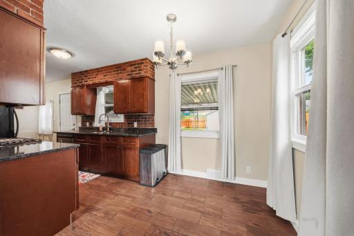 This informal dining room area was made for real life, cereal bowls, coffee mugs, and conversations before anyone's fully awake. The kind of corner your family actually uses every single day.