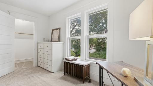 Bedroom 3 on the upper level has a built-in dresser and a 7x4 walk-in closet.