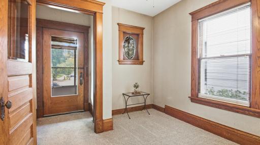 Step into warmth and coziness. This front room has so many possibilities: Office? Reading room? Traditional foyer? Play area? Temporary bedroom?
