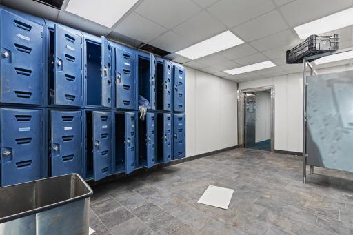 Separate employee locker and changing areas featuring built-in lockers and convenient access to the production facility.
