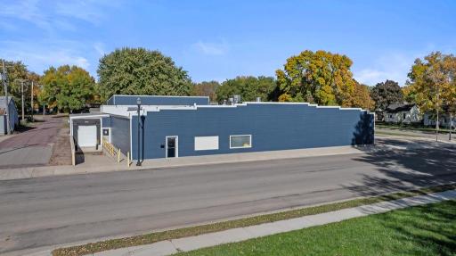 Expansive industrial property featuring a large production facility, dedicated loading access, and a combination of street frontage and alley accessibility.