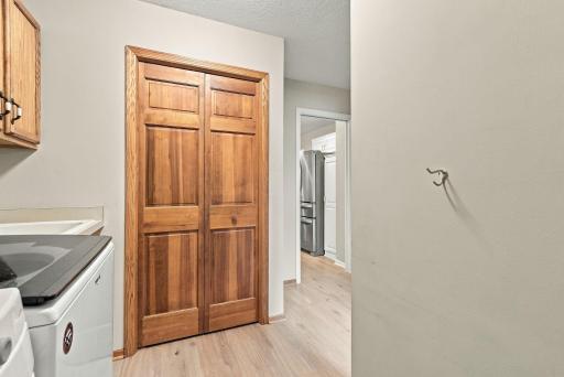 The main level laundry room is just off the garage and includes a coat closet.