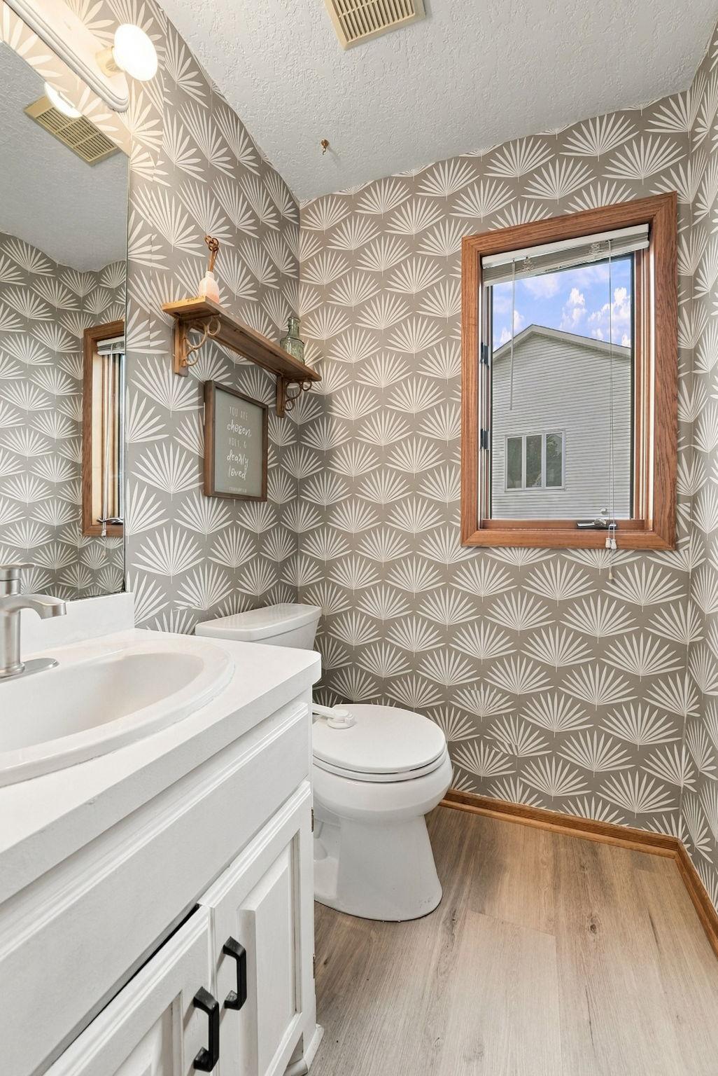 The wallpaper in this home is so classy