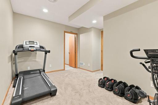 The lower level has enough hall space to create an exercise room