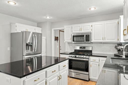 Such a classy space! Granite countertops, stainless appliances and lots of cabinet space!