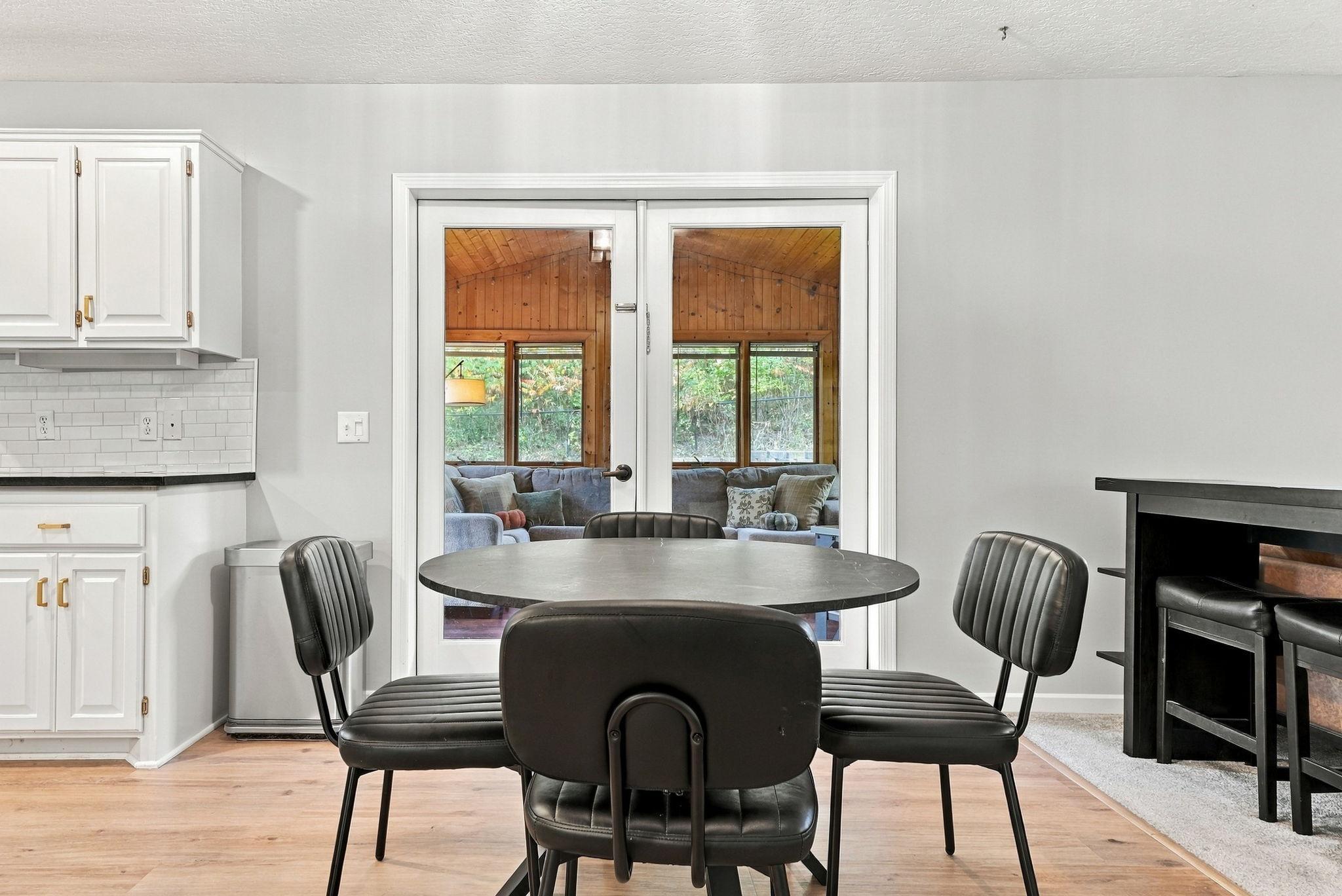 Kitchen looking into the four-season porch