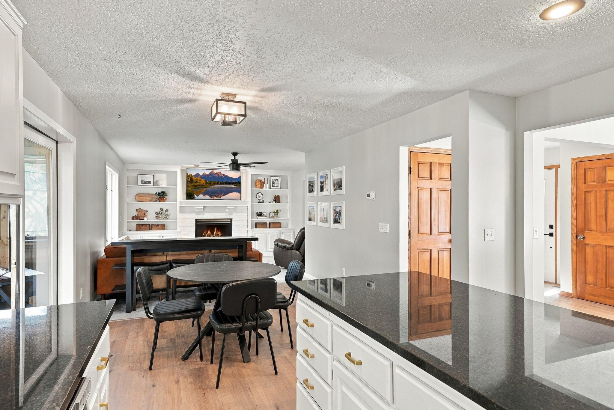 The kitchen has plenty or room for a kitchen table, meaning that you can enjoy meals here, at the breakfast nook or in the formal dining room.