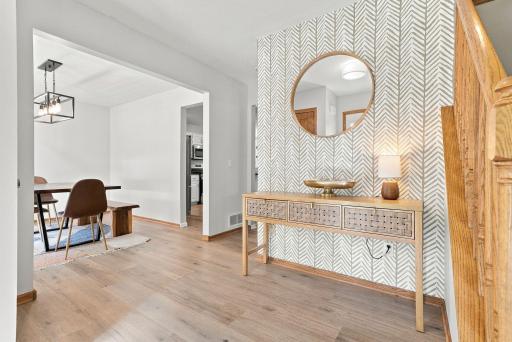 The foyer that greets you as you enter the home is elegant.