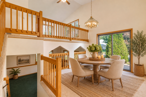 Dining area walks out to grilling patio! Virtually staged.