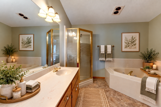 Generous shared pass through bathroom. Virtually staged.