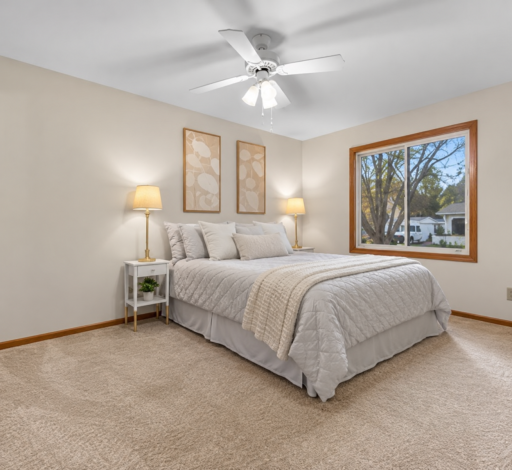 Upper level primary bedroom with a 3/4 bathroom and a walk-in closet. West facing.