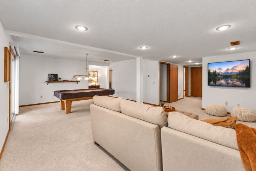 There are a few spaces down here and the space is flexible to what works with your family. The closed door is the storage room and the second open door is currently used as a 4th bedroom.