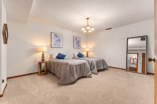 Lower level second non-conforming primary. This room has a full bathroom and a walk-in closet.