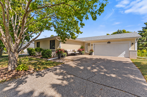 7291 Conestoga Court in Chanhassen MN. Move-in ready with 3 bedrooms and 2 bathrooms on the upper level and a large non-confirming second primary bedroom in the lower level. West facing front door with a lot surrounded by mature trees.