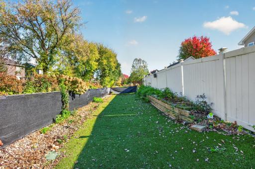 Dog run behind pool area for those fur babies
