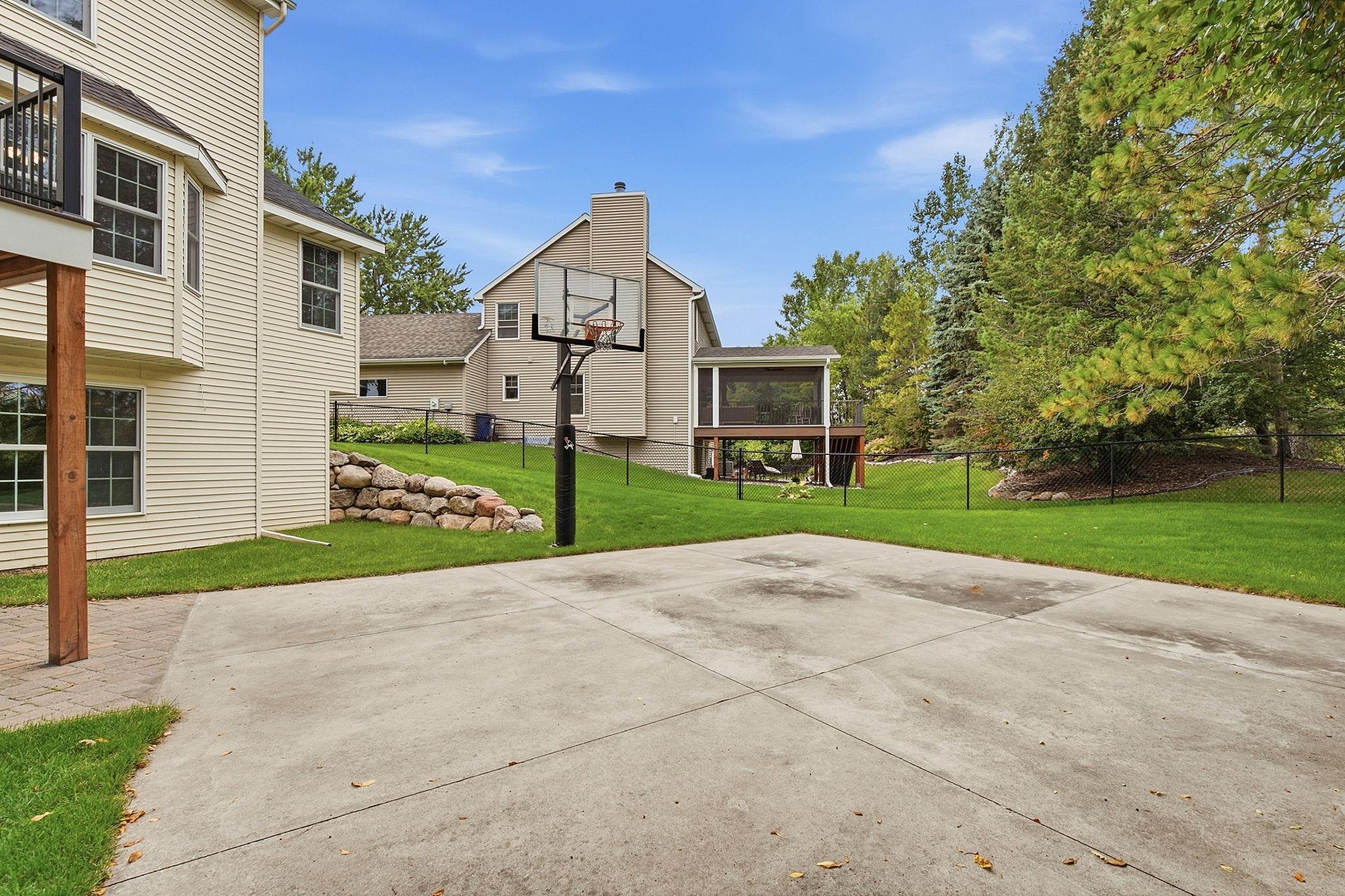 Nice Backyard Sport Court....Could Double As Hockey Rink In Winter!