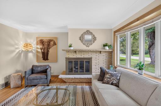 Absolute class! Vintage charm meets modern updates. Fireplace decorative.