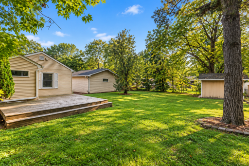 Sunlit Suburban Backyard Retreat (2).png
