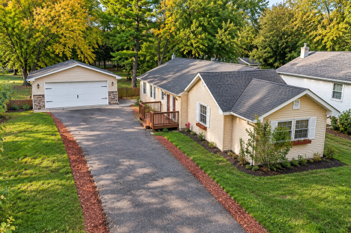 Aerial View of Suburban Home and Garage (1).png