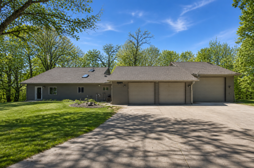 Front of home (AI used to make yard/trees green)