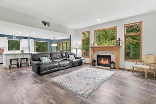 Living room with high ceilings, large windows