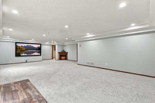 Gas fireplace, movie screen, new carpet, recessed lighting in lower level