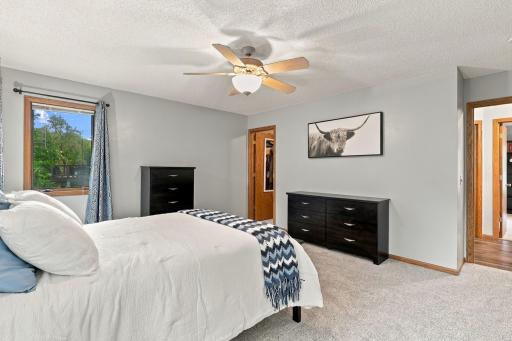 Bedroom has plenty of space, walk-in closet