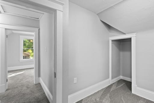 Upper level hallway & 2nd bedroom on right