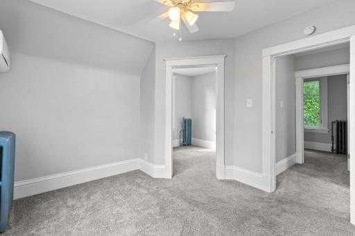 Looking into the den/nursery ( center ) from the upper level front bedroom