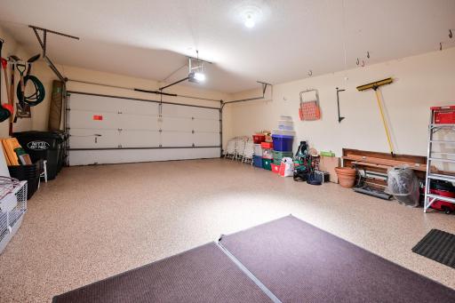 Deep 2 car garage with new epoxy flooring.